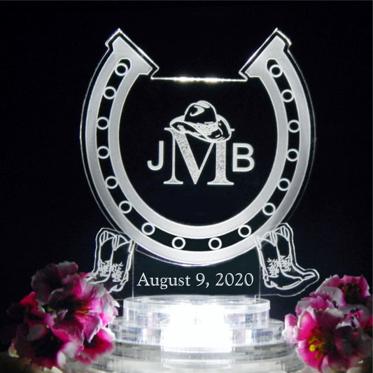 horseshoe shaped acrylic cake topper designed with a horseshoe design and engraved with monogram and date