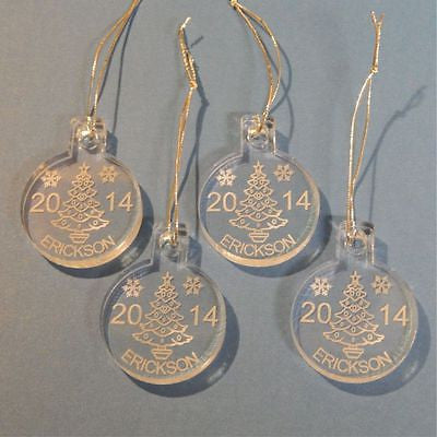 Set of 4 acrylic round ornament showing a Christmas tree design along with Last name and year