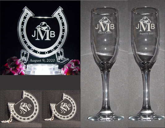 photo showing acrylic horseshoe shaped cake topper, two sizes horseshoe shaped keychains, and a set of two champagne flutes designed with monogram and date of wedding