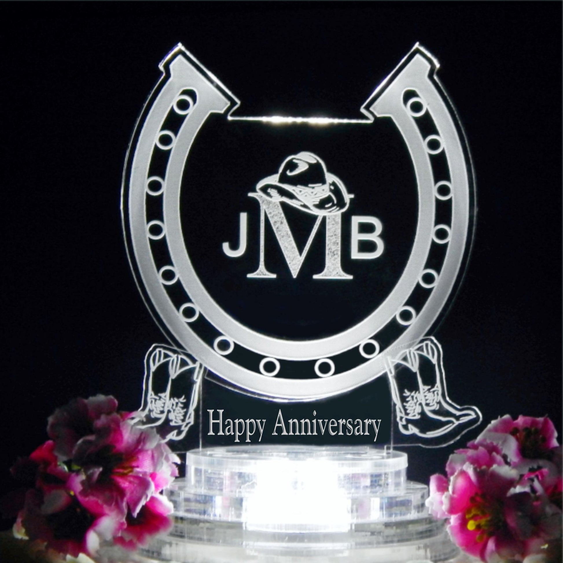 horseshoe shaped acrylic cake topper designed with a horseshoe design and engraved with monogram and Happy Anniversary