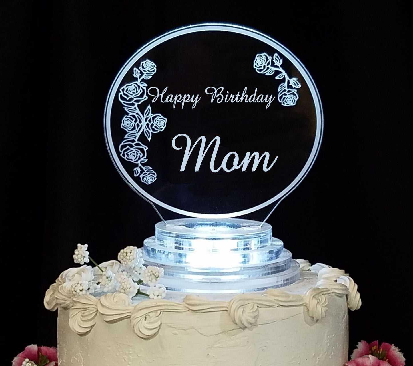 clear acrylic cake topper designed in a rose and rosebud theme,  engraved with Happy Birthday and name