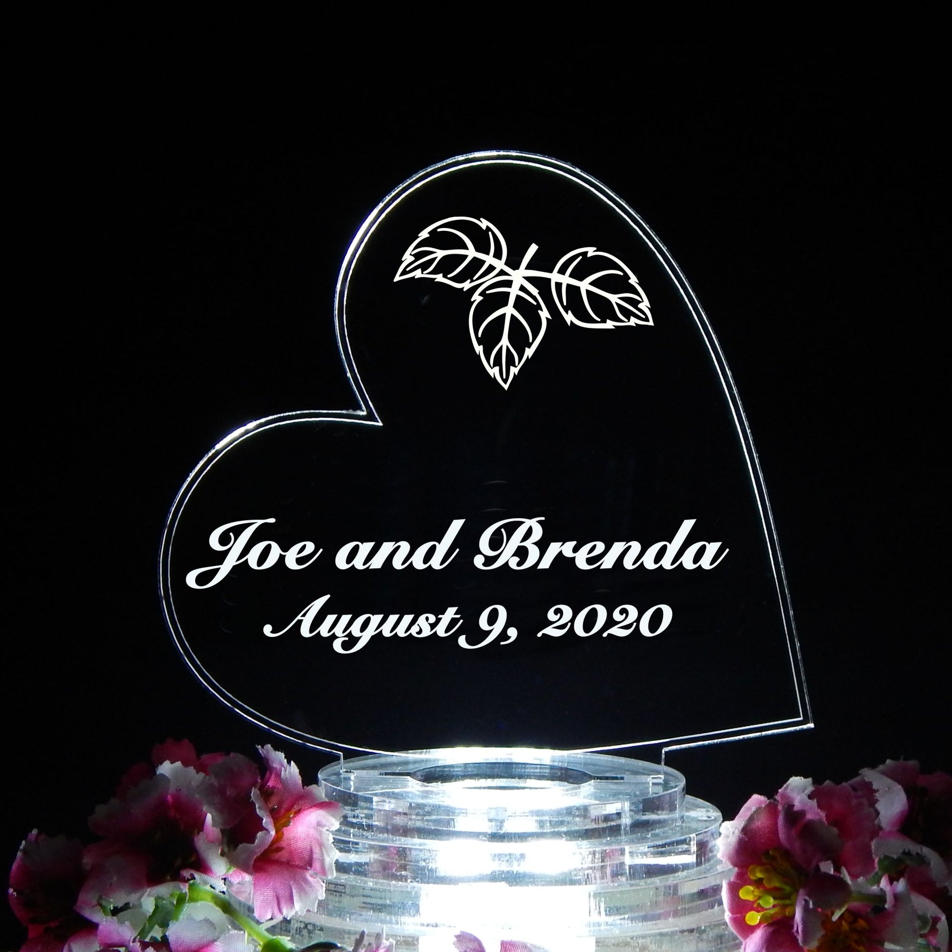 acrylic heart shaped cake topper designed with fall leaves and engraved with names and date