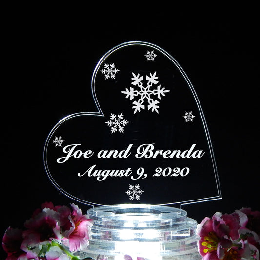 acrylic side heart cake topper designed with snowflakes and engraved with names and date