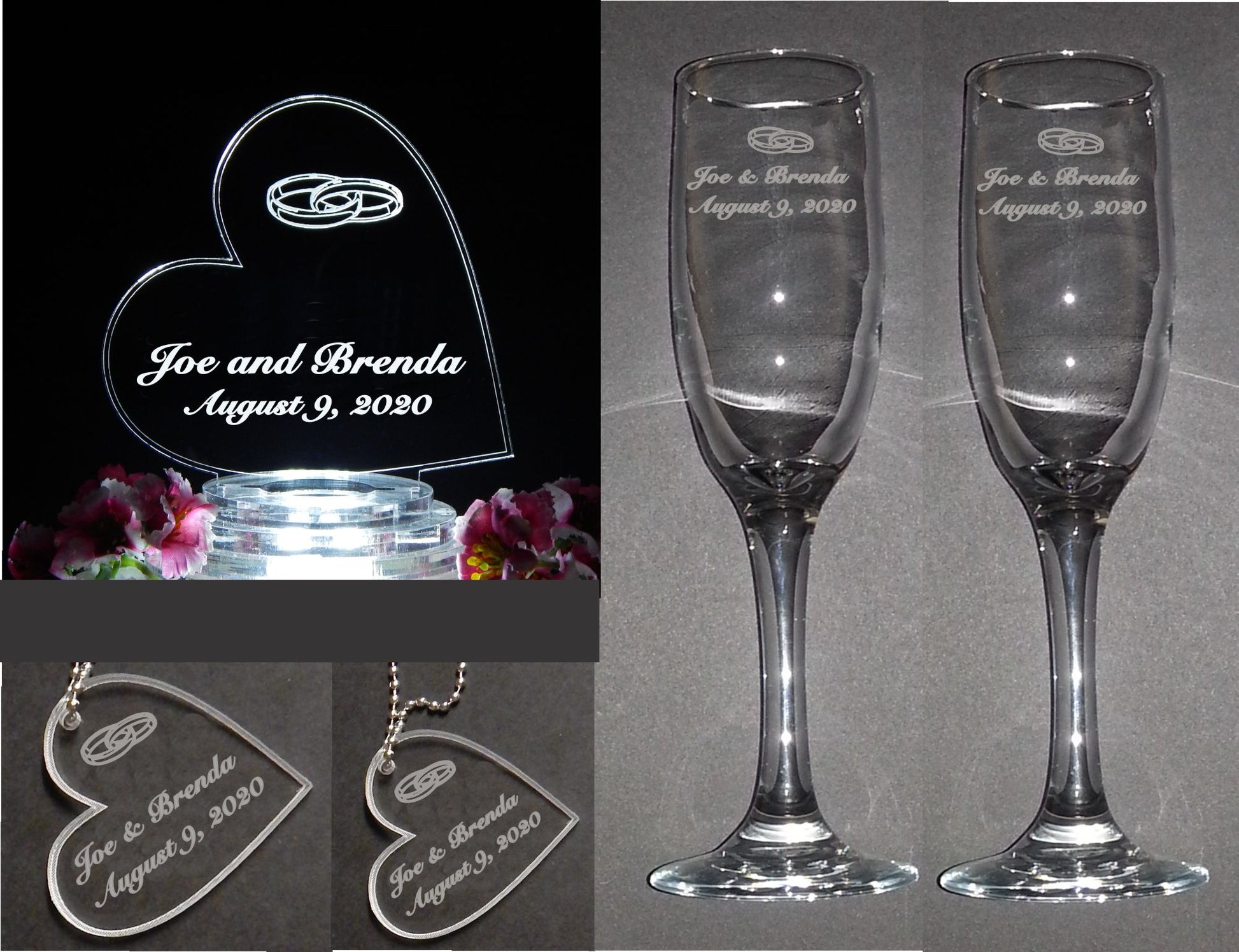 photo showing an acrylic side heart shaped cake topper designed with wedding rings, two sizes of matching heart keychain, and a set of two champagne flutes engraved with names, date and wedding rigns