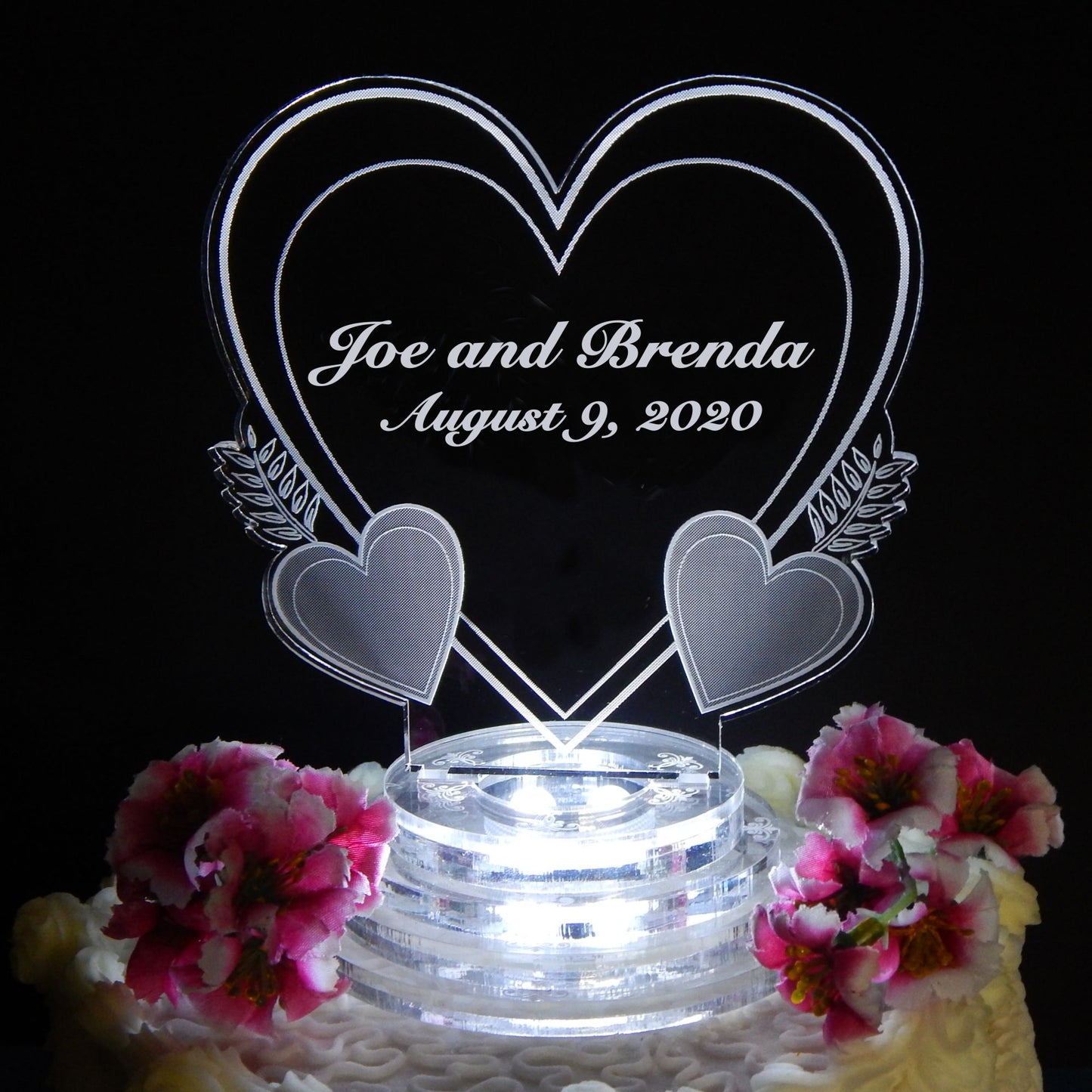 acrylic heart shaped cake topper engraved with names and date