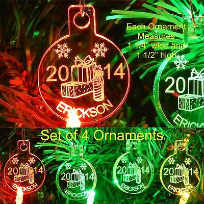 acrylic round ornaments with gift boxes designed along with a name and year