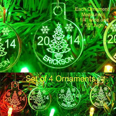 acrylic round ornament showing a Christmas tree design along with Last name and year