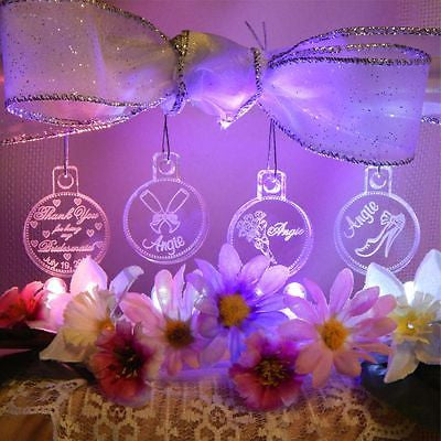 set of 4 clear ornaments with one Thank you, one with flutes, one with flowers, and one with a shoe