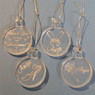 set of 4 clear ornaments with one Thank you, one with flutes, one with flowers, and one with a shoe