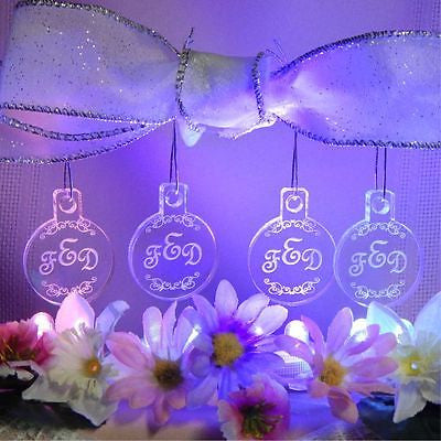 4 acrylic round ornaments with 3 letter monogram and pretty design engraved