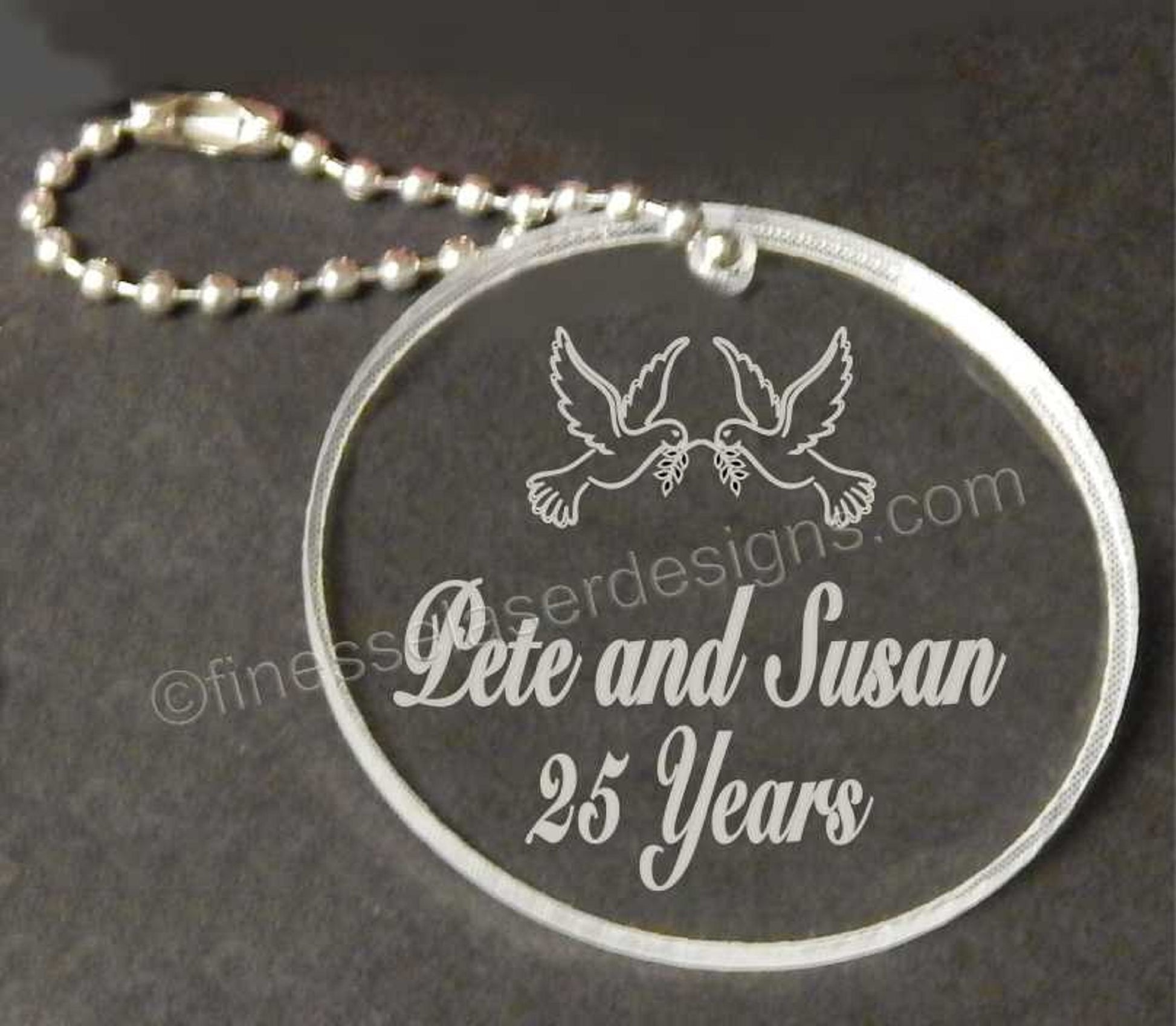 Acrylic round keychain with doves and names and 25 Years