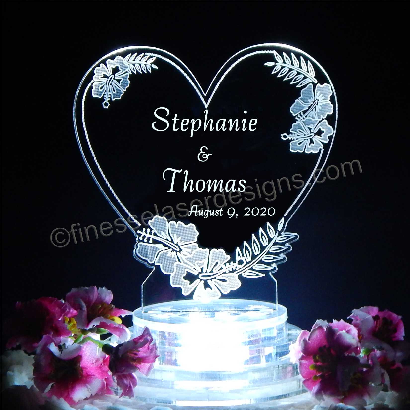 clear acrylic heart shaped cake topper designed with hibuscus flowers and names and date engraved