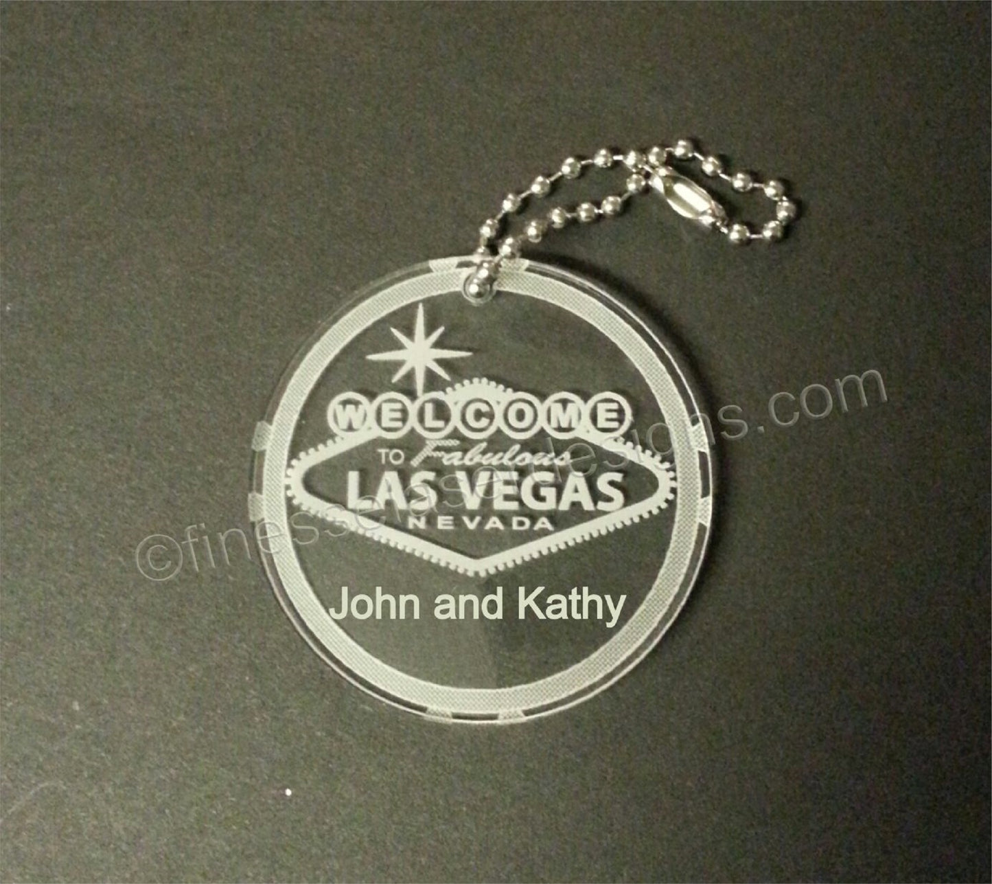 Round Welcome to Las Vegas keychain with names
