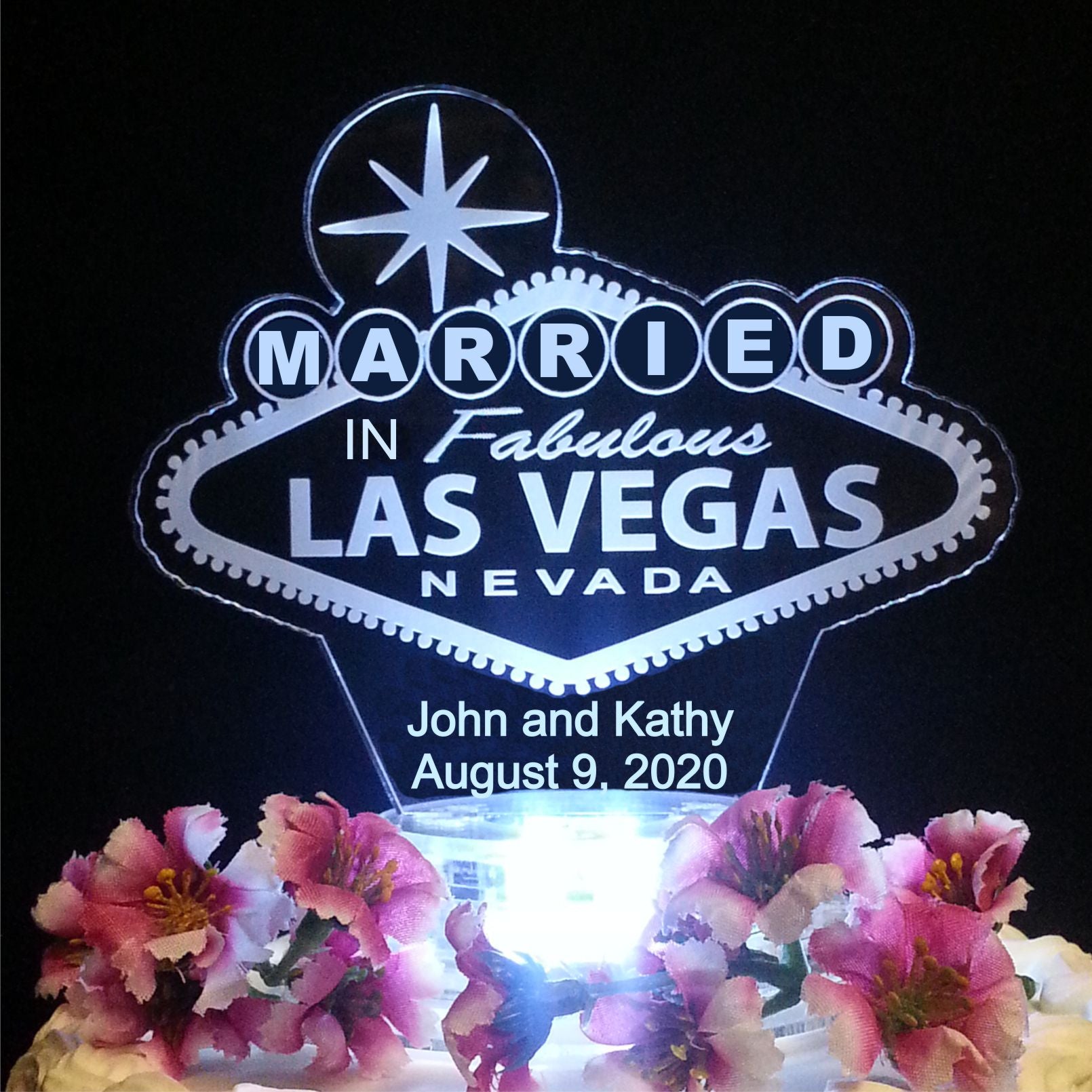 Married in Las Vegas lighted cake topper along with names and date