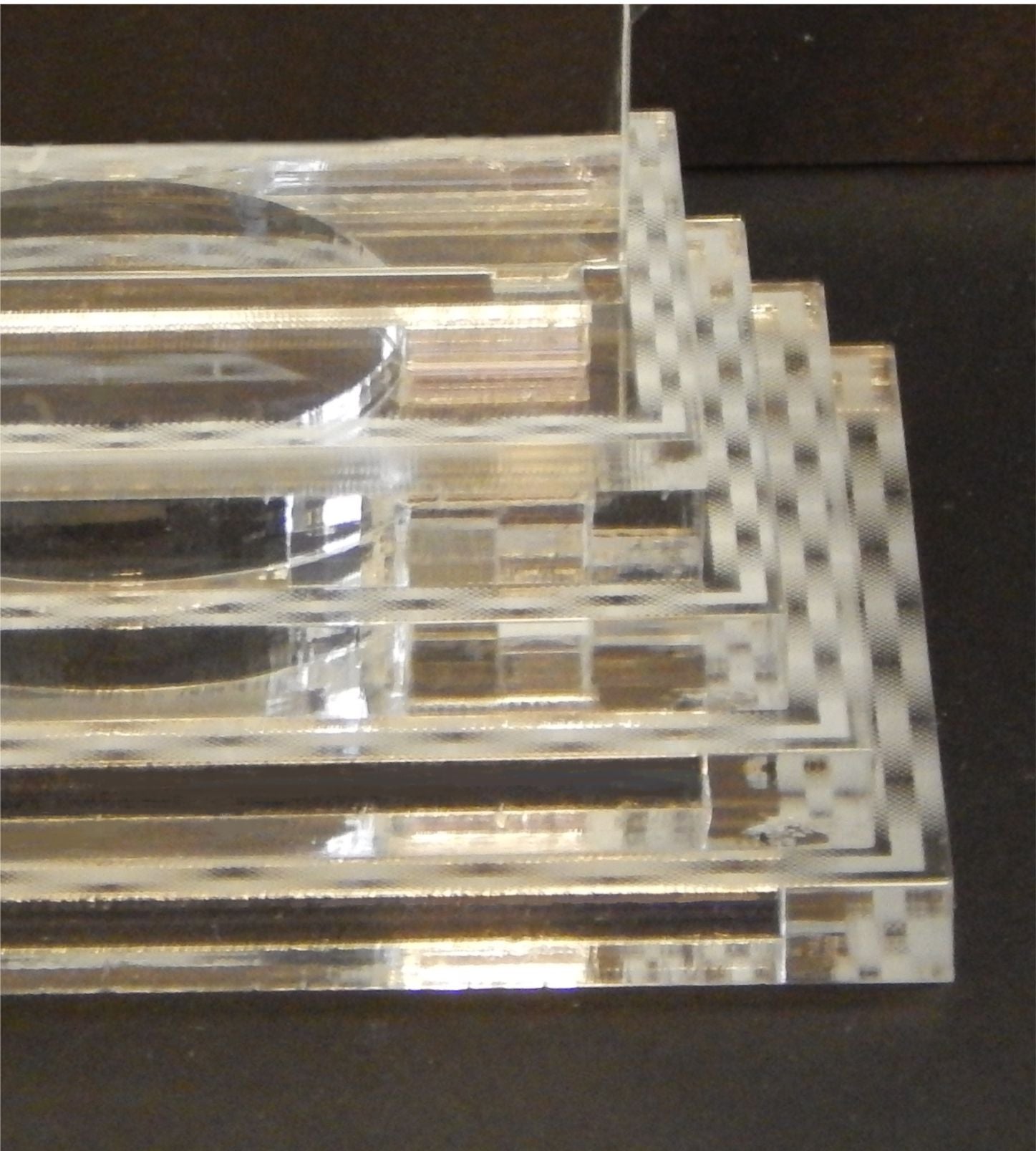 side view of an acrylic rectangular base for a cake topper