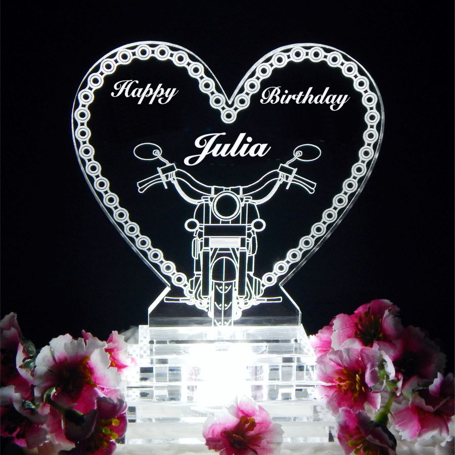 acrylic heart shaped cake topper with a motorcycle chain border and front view of a motorcycle, including Happy Birthday and name