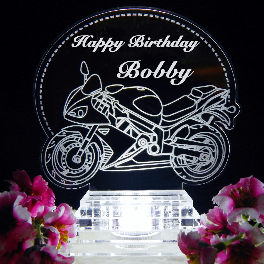 acrylic cake topper with side view of a sports motorcycle with Happy Birthday