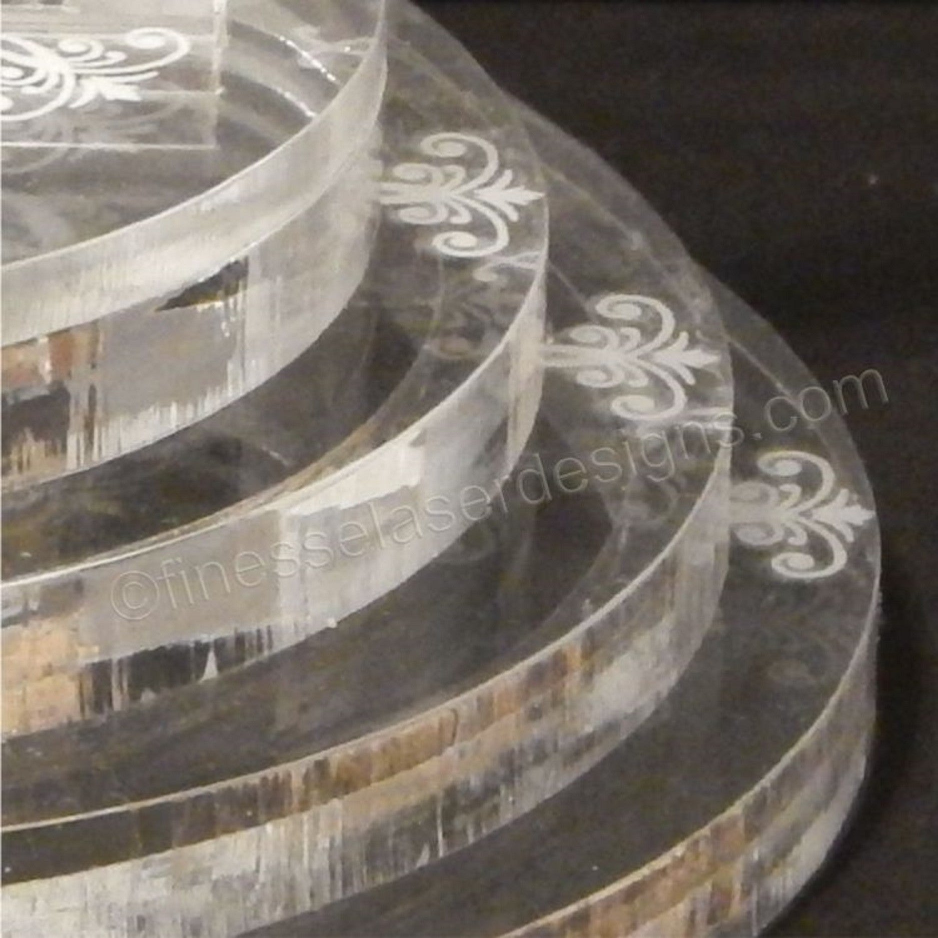 Side view of round acrylic cake top base